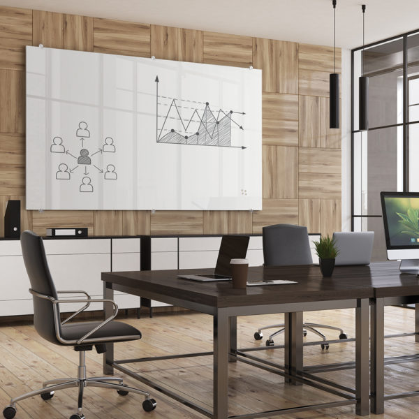 Modern office interior with wooden walls and floor, white shelves, several tables put together. There is a computer monitor, a laptop and a large horizontal poster. 3d rendering mock up